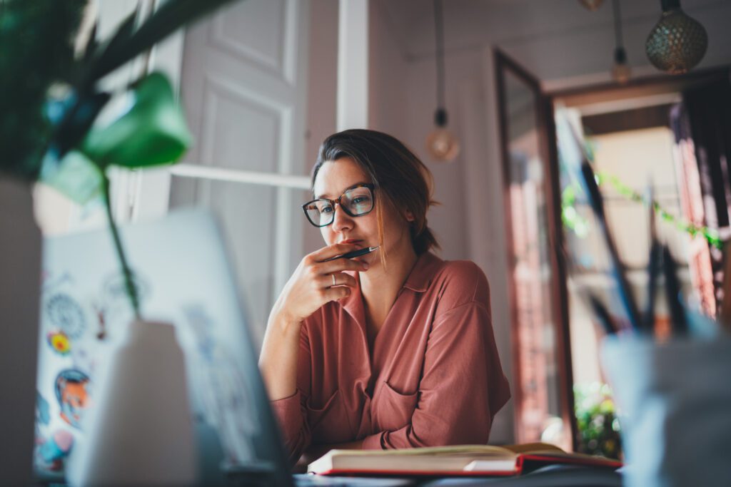 Adult at work, illustrating qualifying activities under Healthy Michigan Plan work requirements