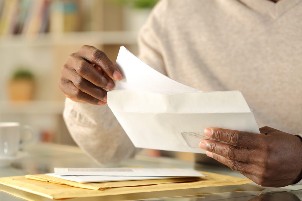 Michigan resident reviewing a Medicaid coverage notice about 2027 changes